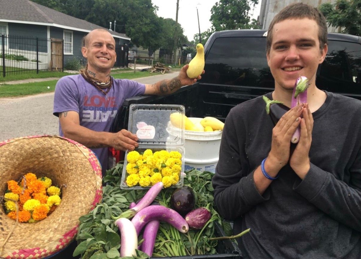 Robert sharing a harvest from the garden